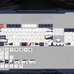 Premium Ultraman Tiga GUTS PBT keycaps, side-printed and backlit. Exclusive retro-futuristic design featuring tactical carbon fiber legends.