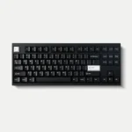 WOB Pure Black PBT Cherry keycaps. Detailed view of durable PBT, crisp doubleshot legends, and classic black and white refined aesthetic.