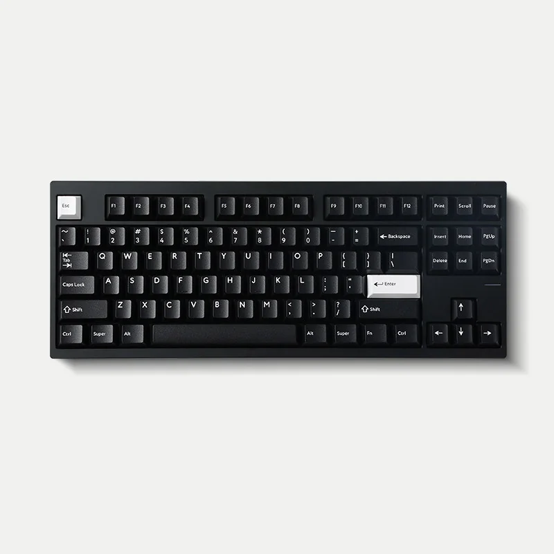 WOB Pure Black PBT Cherry keycaps. Detailed view of durable PBT, crisp doubleshot legends, and classic black and white refined aesthetic.