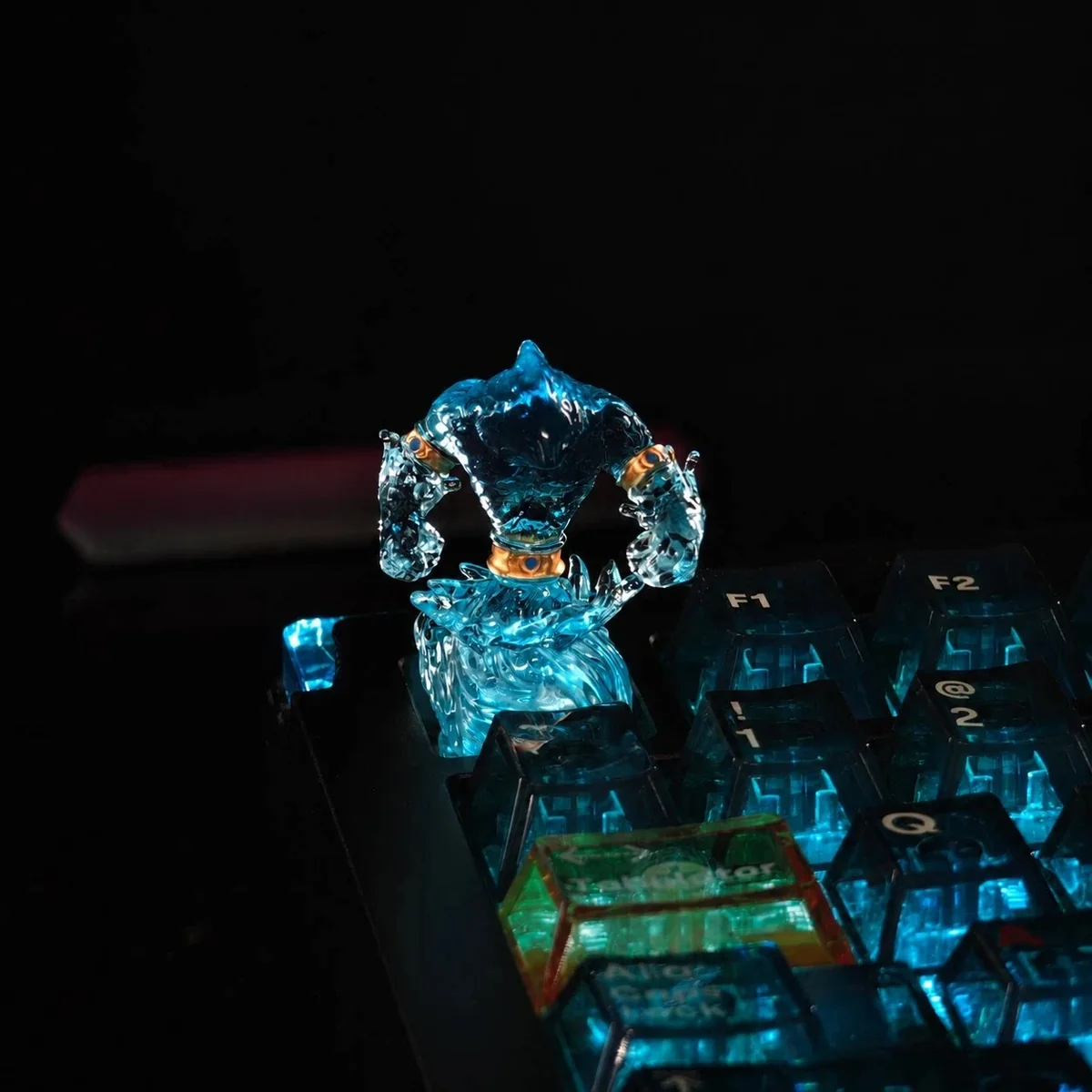 Close-up of a handcrafted WoW Water Elemental keycap, showcasing its mystical blue sculpted details and intricate fantasy gaming aesthetic from a unique angles.