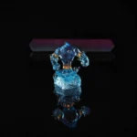 Close-up of a handcrafted World of Warcraft Water Elemental keycap, showcasing its mystical blue hues and intricate sculpted details from a unique angles.