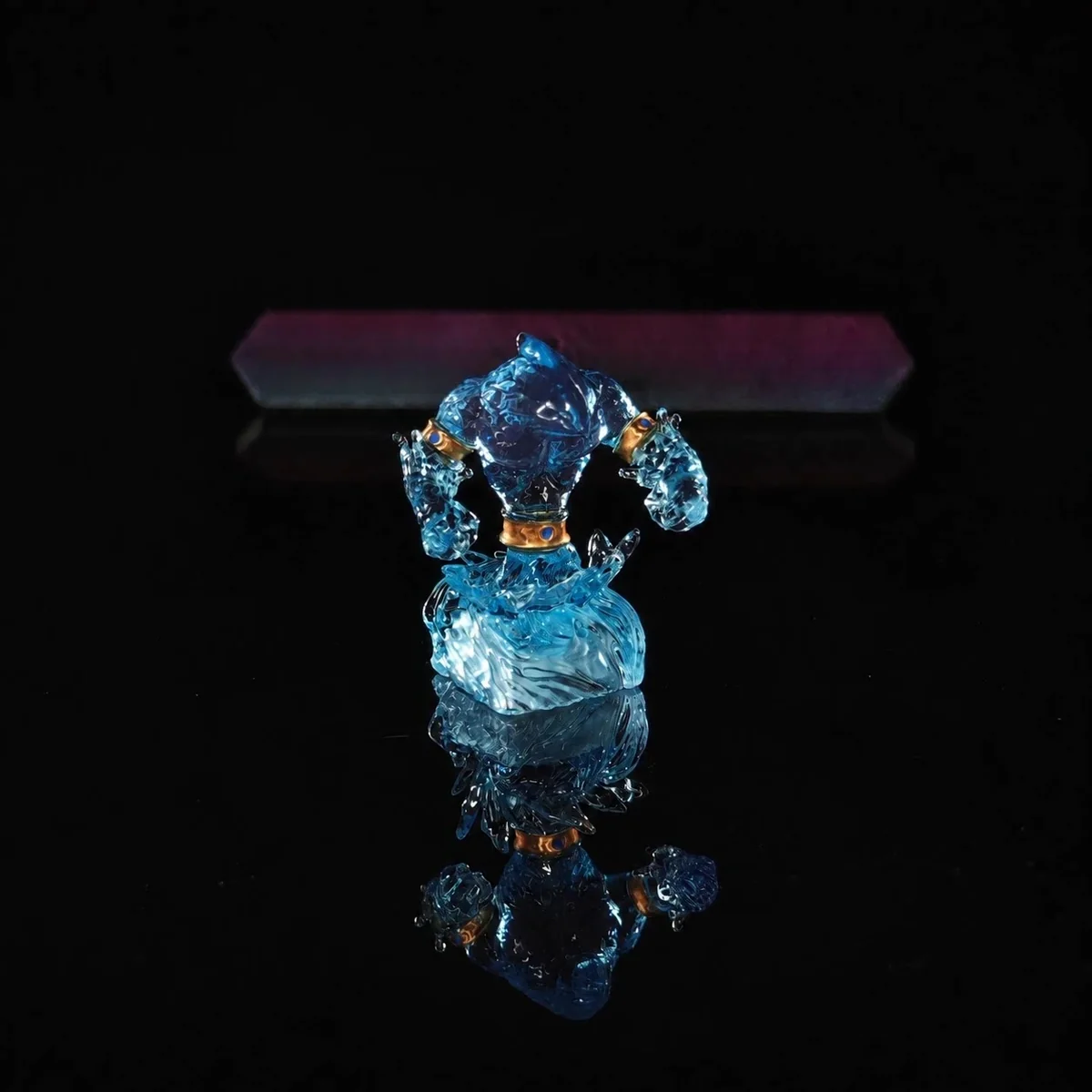 Close-up of a handcrafted World of Warcraft Water Elemental keycap, showcasing its mystical blue hues and intricate sculpted details from a unique angles.