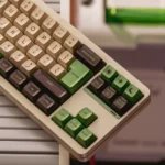 Iconic Yoda SA Keycaps from various angles, highlighting sculpted SA profile and double-shot ABS. Playful retro Star Wars adventure set.