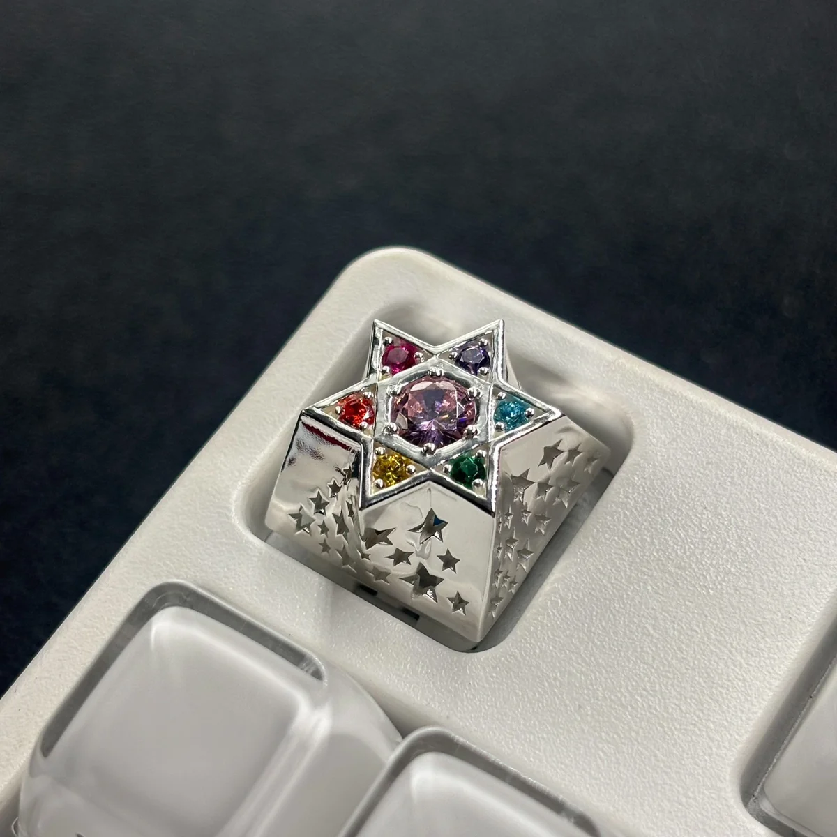 Handcrafted Zircon Hexagram Luxury Metal Keycap. Multiple angles reveal sparkling zircon, gleaming metallic hexagram, for mystical celestial luxury.