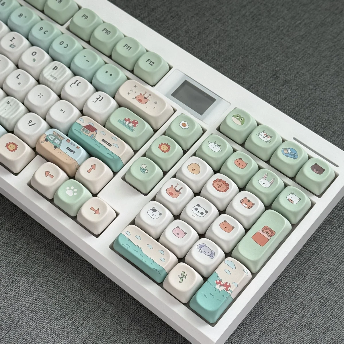 Adorable zoo MOA PBT keycap in a gallery shot, highlighting its charming, vibrant green, rounded animal design. A whimsical and playful keyboard accent.