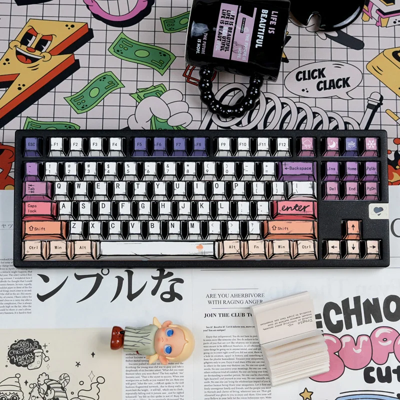Hand-drawn graffiti keycaps on a black keyboard, featuring bold PBT keycaps with vibrant color blocking and playful street art icons.