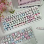 Adorable pet MOA keycap set featuring whimsical cartoon animals from various angles, showcasing the charming PBT dye-sub designs for a playful keyboard.