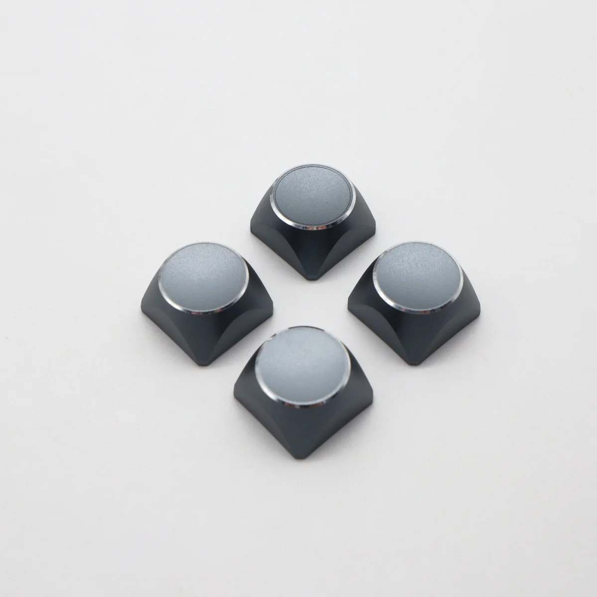 Premium aluminum Arrow keycaps, showcasing a durable electroplated metallic finish and vibrant color accents. Modern XDA profile ensures superior tactile feedback.