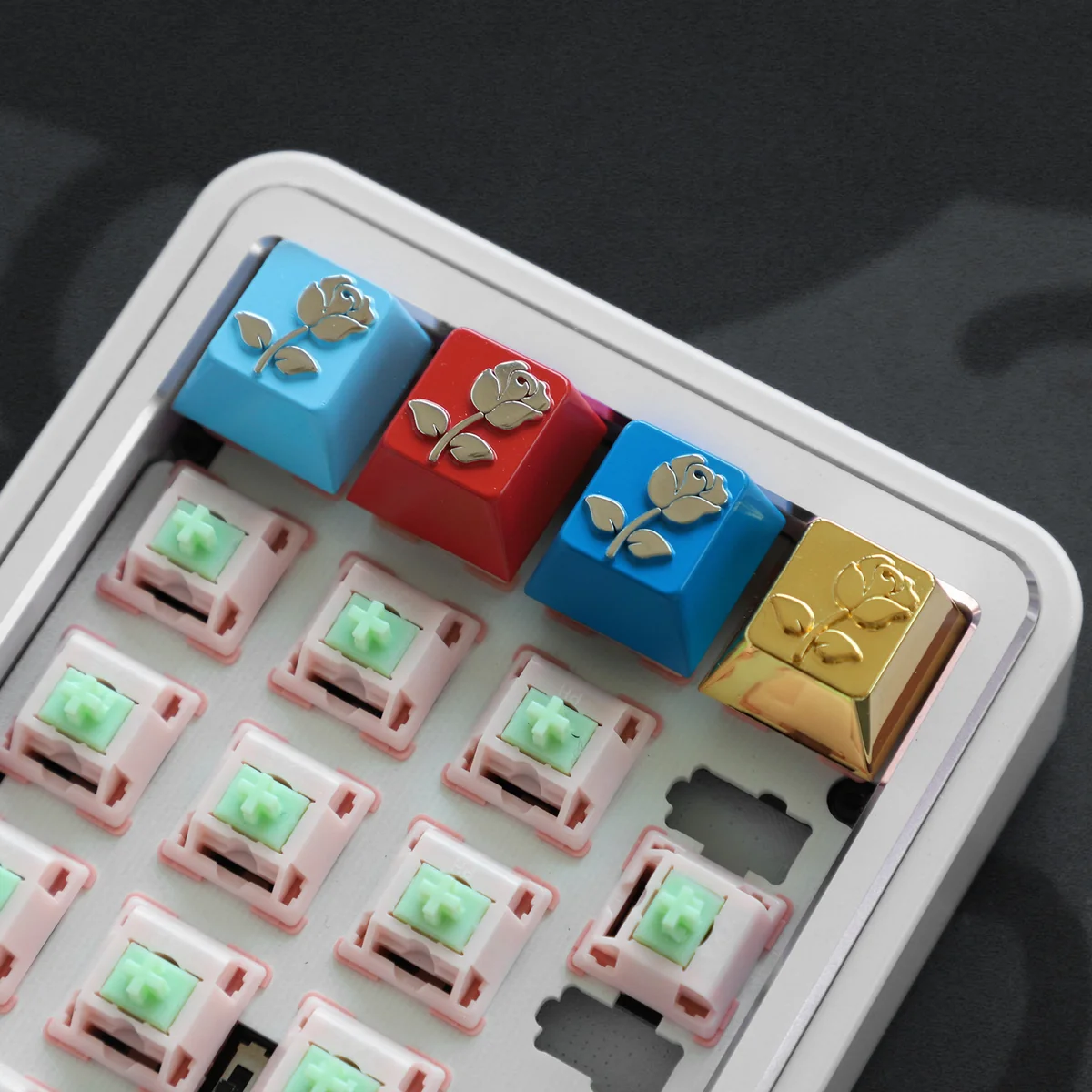 Limited Edition Zinc Alloy Rose Artisan Metal Keycap, showcasing its intricate metallic rose design and mysterious sea fog effect from multiple artisan angles.