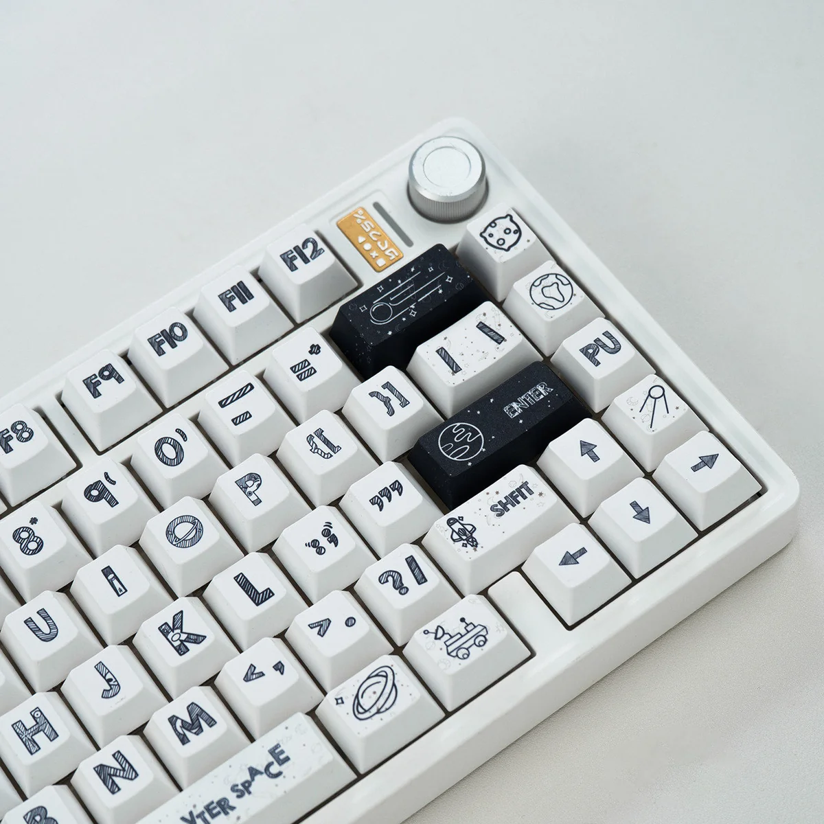 Playful Astronaut PBT Keycaps: A full 131-key dye-sub set showcasing crisp astronaut legends and a clean white base from multiple angles.
