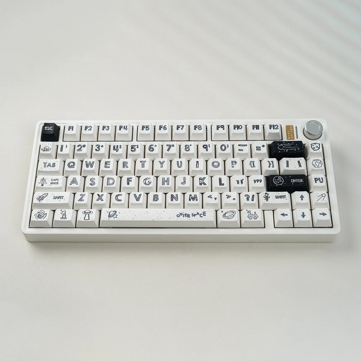 Astronaut PBT Keycaps set, displaying durable PBT with crisp dye-sublimated astronaut legends on a clean white base. Playful space theme.