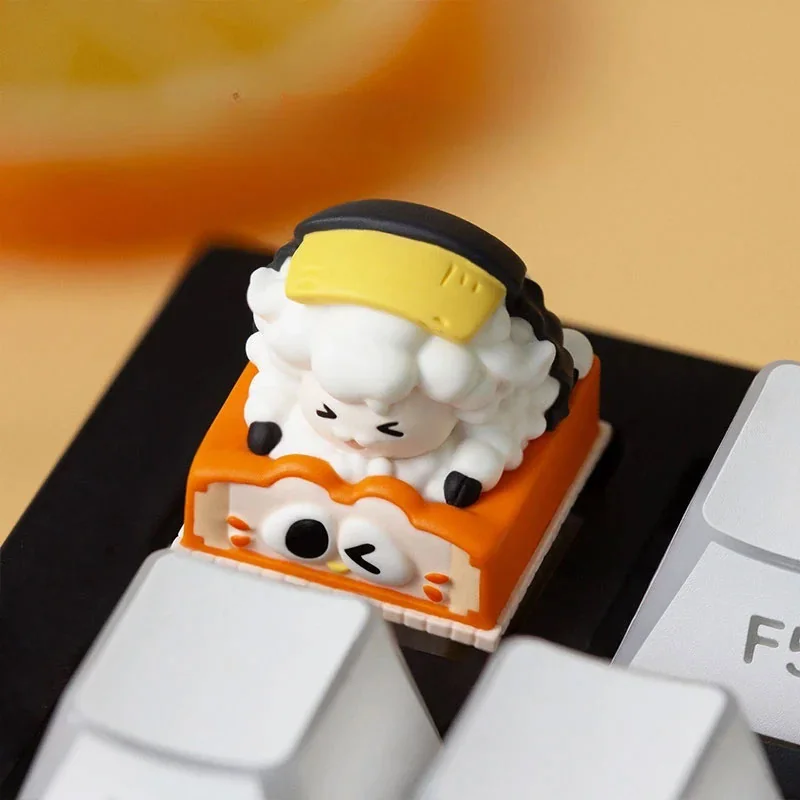 Close-up of a whimsical Baa-Baa Sushi Shop keycap, showing intricate details of miniature vibrant sushi pieces from various angles.