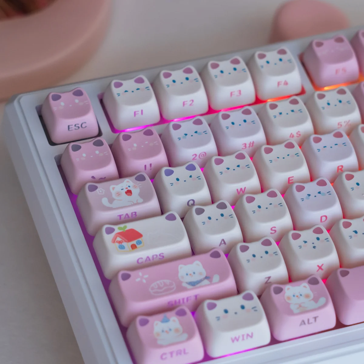 Detailed view of whimsical spring kitty backlit PBT cat ear keycaps, highlighting glowing ears and unique side-printed legends for a charming.