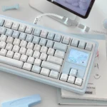 Close-up of an elegant handcrafted ceramic keycap from the Winter Letter set, showcasing its unique texture and premium, serene design.