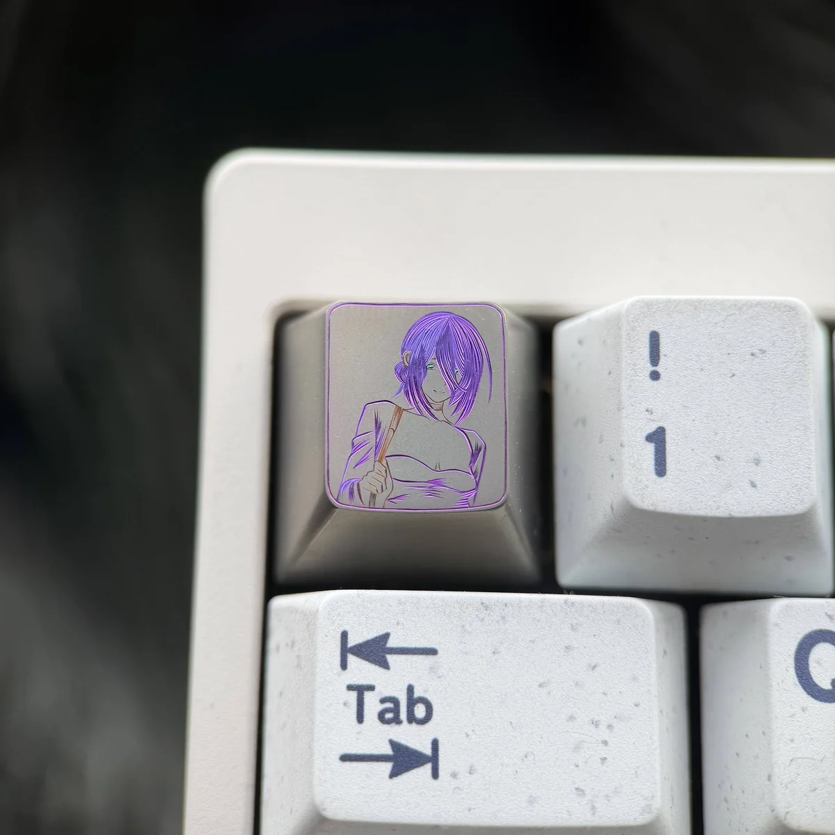 Chainsaw Man Reze artisan titanium keycap, hand-carved with dynamic colored lines for Theme Two, a collectible anime accessory.