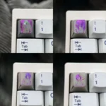 Dynamic Chainsaw Man Reze hand-carved titanium keycap, showcasing intricate artisan detail and vibrant accents on a metallic collectible.