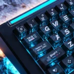 Side view of the premium CSGO Printstream Carbon Fiber Keycap Set, highlighting its carbon fiber texture and vibrant shine-through CS:GO inspired graphics.