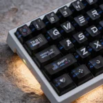 "Premium translucent CSGO Printstream PC keycaps displaying iconic gaming art with vibrant RGB pass-through, captured from a unique angle."