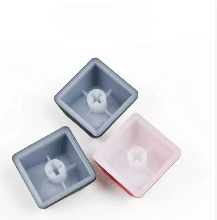 Multiple views of the Ascend Graph R4 keycap, highlighting its vibrant translucent glow and premium, playful design for dynamic customization.