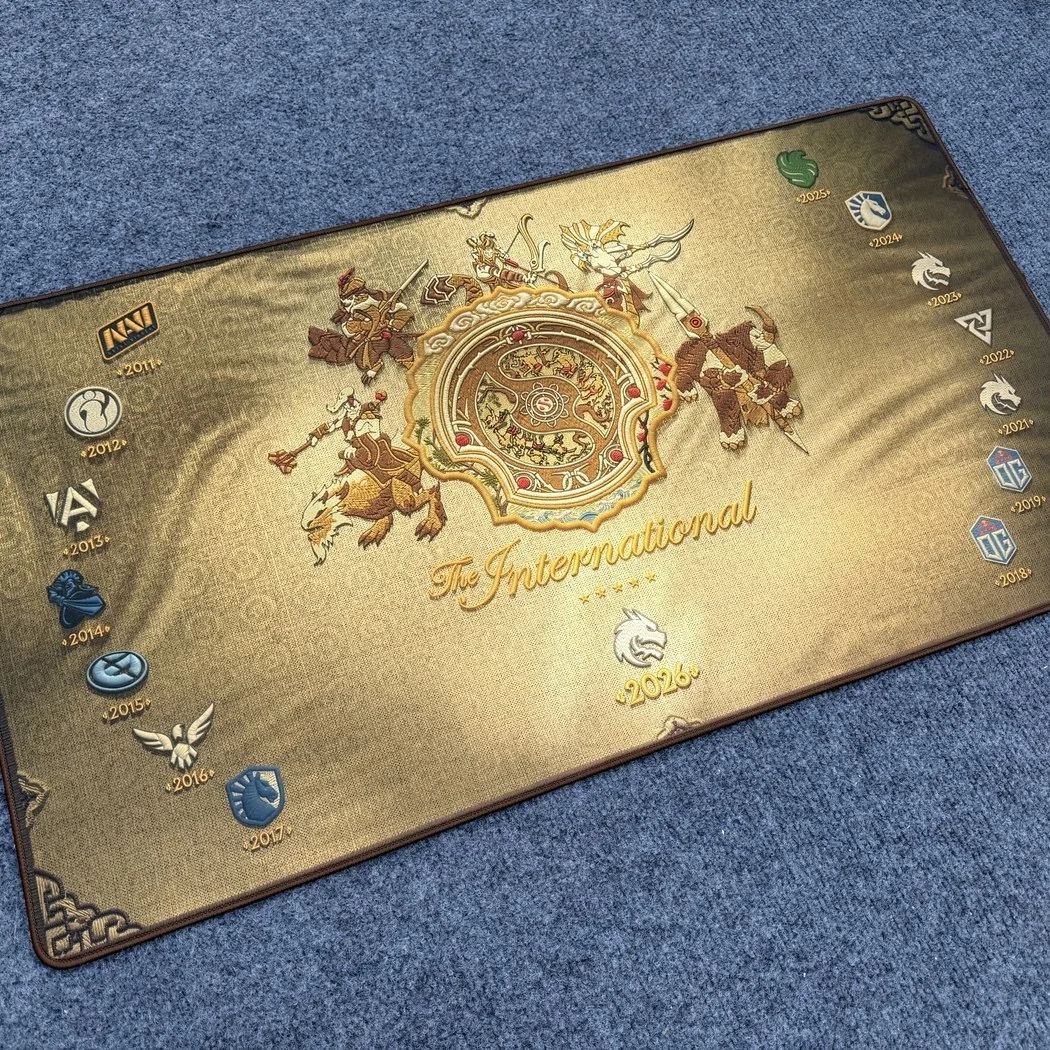 Detailed shot of the DOTA 2 TI15 2026 Champions Team Spirit Desk Mat, showcasing the majestic artwork and commemorative championship.