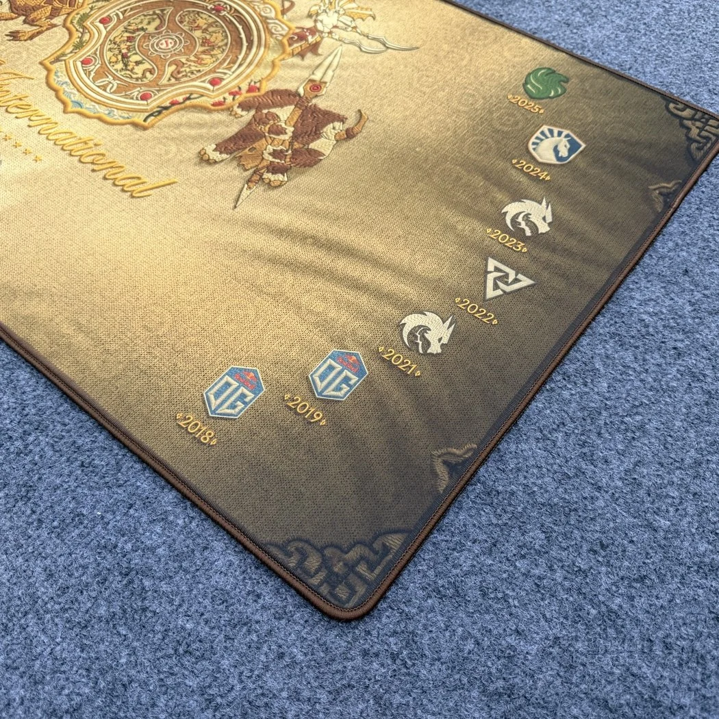 DOTA 2 TI15 2026 Champions Team Spirit Desk Mat, displaying the majestic artwork and premium edge stitching from a detailed view.