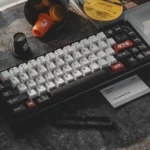 Drift keycap set featuring JDM drift racing aesthetic with white alphas, black modifiers, and red car novelty keys in ABS double-shot.