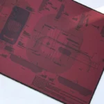 A sophisticated extra-large natural rubber gaming desk mat displayed from multiple angles, showcasing its minimalist design.