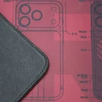Close-up of the extra-large natural rubber gaming desk mat, highlighting its smooth, minimalist surface and precision-stitched edges for a sophisticated setup.