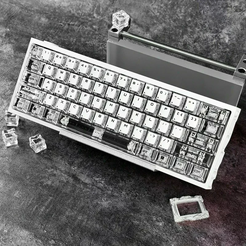Multiple views of the 20th Anniv. Night Demon SE Gaming Keycap Set, featuring black and white special edition design and intricate details.