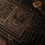 Luxurious Gatsby desk mat with opulent golden Art Deco patterns, highlighting premium texture and intricate design for an elegant workspace.