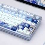 Genshin Impact Anastasya PBT translucent keycaps displayed from various angles. Ethereal icy blue and white tones highlight the premium Anastasya element design.