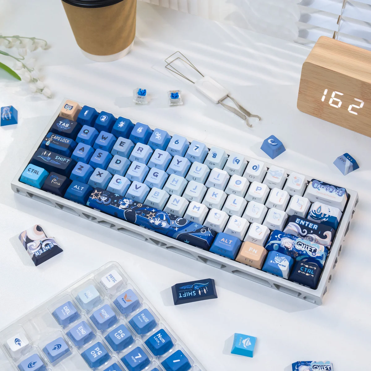 Close-up views of the elegant Furina Hydro Archon PBT dye-sub keycap set, showcasing vibrant Genshin Impact artistry and exclusive fan-inspired details.