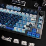A gallery of Freedom Gundam PBT mecha keycaps, displaying their dynamic futuristic design and intricate robotic details from multiple angles.
