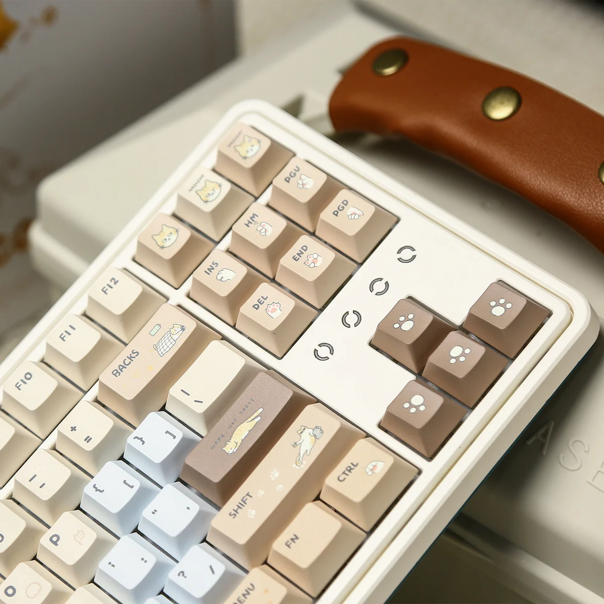 Various angles of the adorable Hakimi PBT dye-sub keycap set, showcasing its charming, soft-hued characters and playful motifs for custom keyboards.