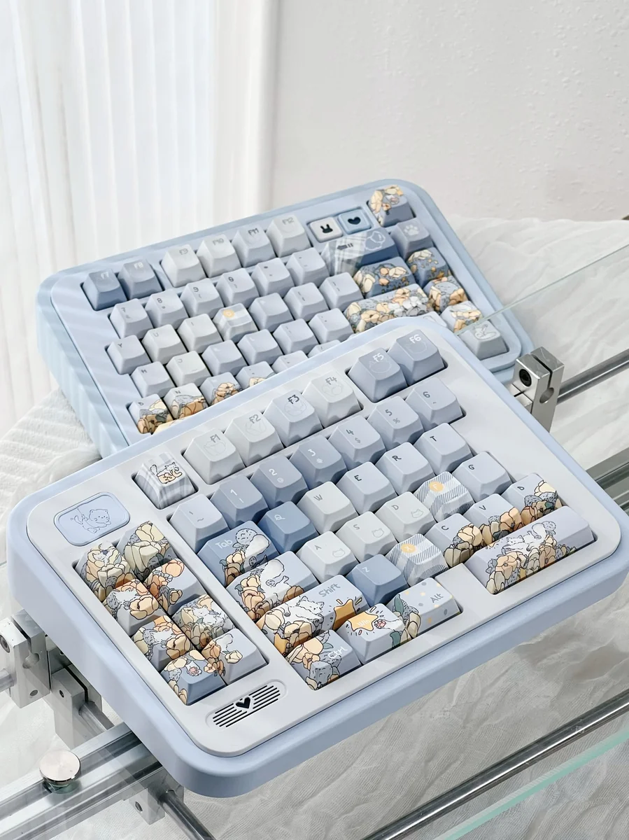 Exquisite hand-painted blue keycap set, showcasing whimsical dandelion and fox art in dreamy blue hues. Brings artistic fantasy to your desk.