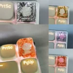 Handcrafted 3D Camellia Artisan Resin Keycap (SA Profile) displaying delicate blooms in clear resin with shimmering metallic foil.