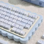 Adorable PBT MOA Healing Bear keycaps, showcasing charming pastel bears for a serene and whimsical desktop setup, perfect for joyful typing.