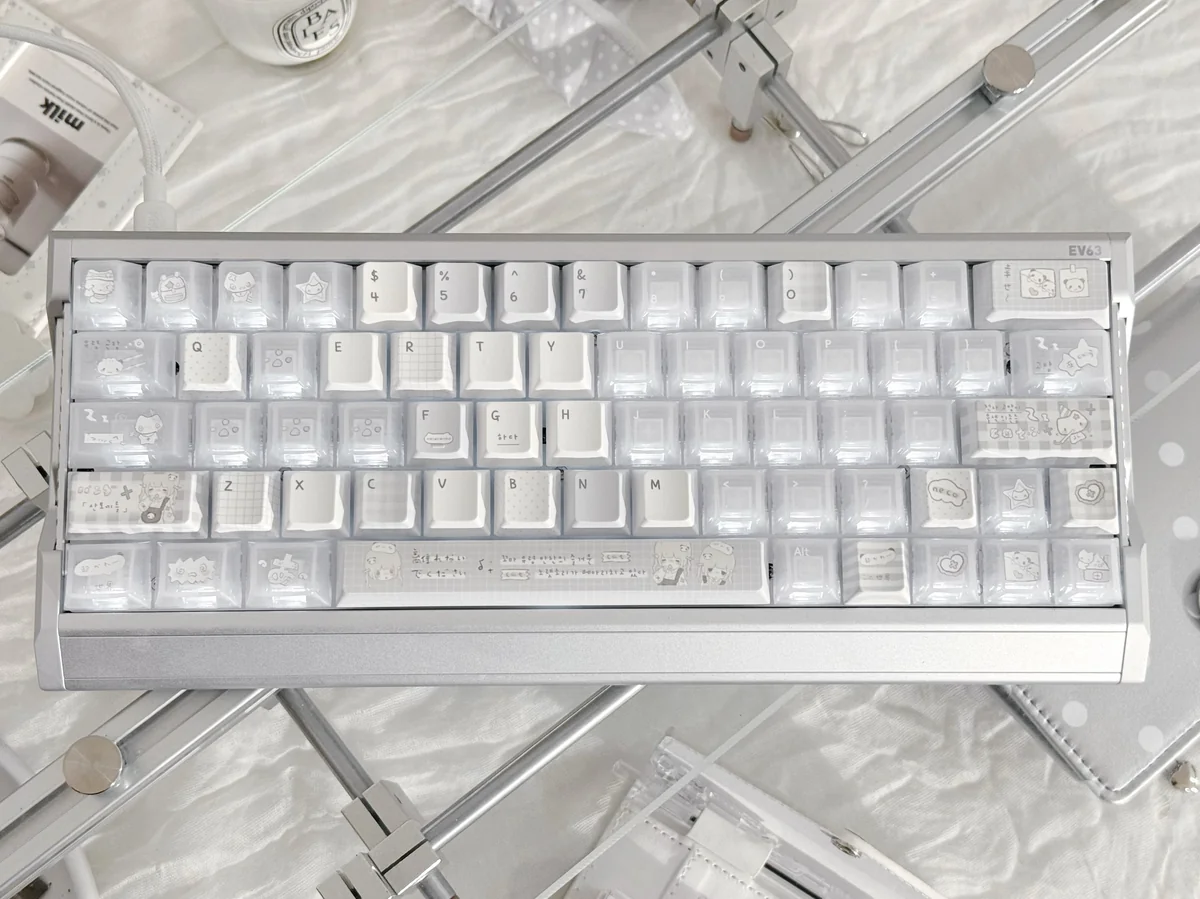 Insomnia Keycaps: Serene muted grey PBT backlit set, showcasing the unique minimalist design and soft translucent glow for a contemplative aesthetic.