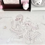 Oversized kawaii anime desk mat featuring pastel pink lolita cat-girl line art, ribbons, hearts and polka dots, waterproof and non-slip.