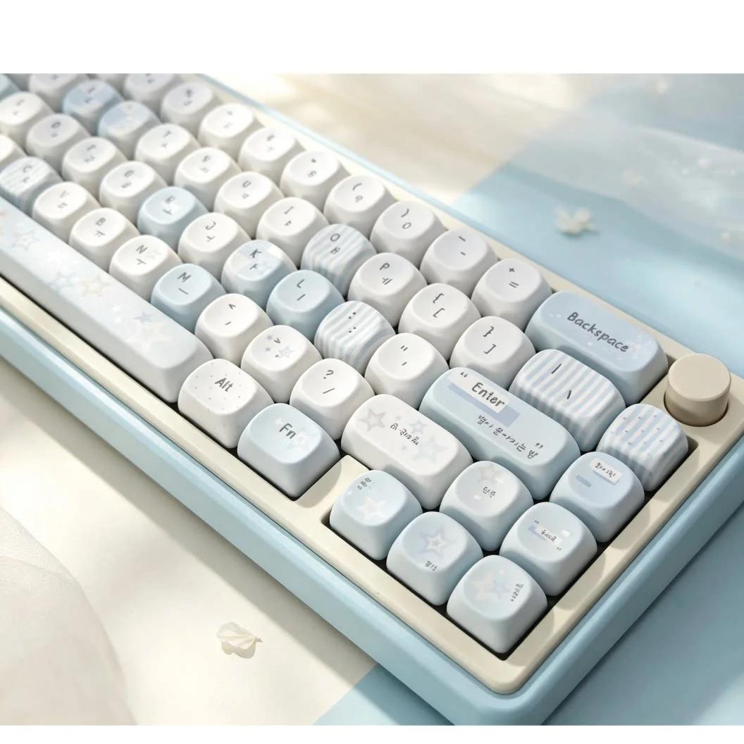 Close-up of serene grey-blue Korean MOA PBT keycaps set, showcasing their unique rounded profile and crisp Korean legends for elegant typing from multiple angles.