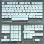 Close-up of serene grey-blue Korean MOA PBT keycap set, showcasing the unique rounded profile and crisp Korean legends, perfect for elegant custom keyboard.