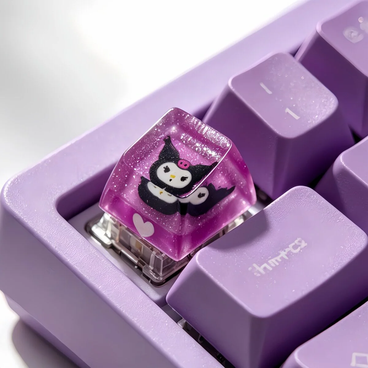Close-up of a mischievous handcrafted translucent Kuromi resin SA profile keycap, showcasing its glossy finish and vibrant glow from multiple angles.