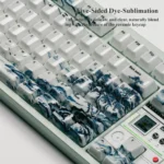 Landscape Painting ceramic keycap, displaying a unique angle of its traditional landscape painting and premium, high-gloss finish, ideal for Zen desk.