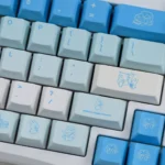Artistic product images of Leisure Rabbit PBT keycaps, showcasing the full whimsical blue and white rabbit motifs from various angles.