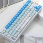 Whimsical Leisure Rabbit PBT Keycaps, blue and white. Durable PBT full set with serene rabbit motifs for an artistic, tranquil desktop.