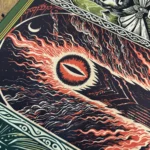 Artistic close-up of the Lord Rings Desk Mat, showcasing a detailed section of the authentic Middle-earth map and vibrant fantasy landscapes.