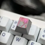 Hand-carved titanium Makima artisan keycap, intricate Chainsaw Man line art. Dark metallic finish from a unique angle, artistic.