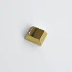Showcasing a premium zinc alloy R1 1.25u blank metal keycap from multiple angles, emphasizing its sleek metallic finish and elegant minimalist design.