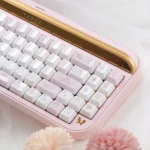Whimsical My Melody Ceramic Keycaps set, photographed from diverse angles to emphasize the exquisite craftsmanship, adorable pastel design, and luxurious glossy finish.