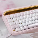 Whimsical My Melody ceramic keycaps set, showcasing exquisite craftsmanship and adorable pastel designs from various angles.